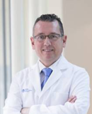 Dr Carlos De Minteguiaga